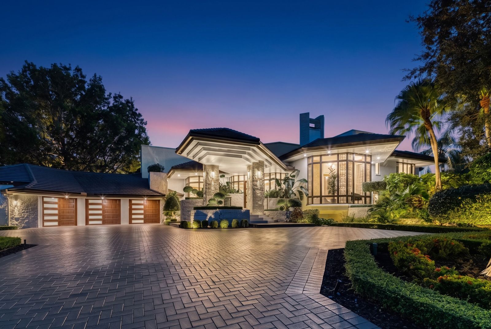Established Weston luxury home with mature palms and finished pool terrace.