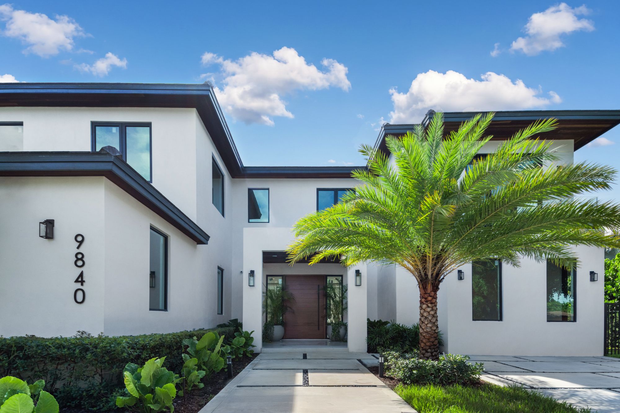 Architectural plans and stone samples for a custom luxury home in Southwest Ranches
