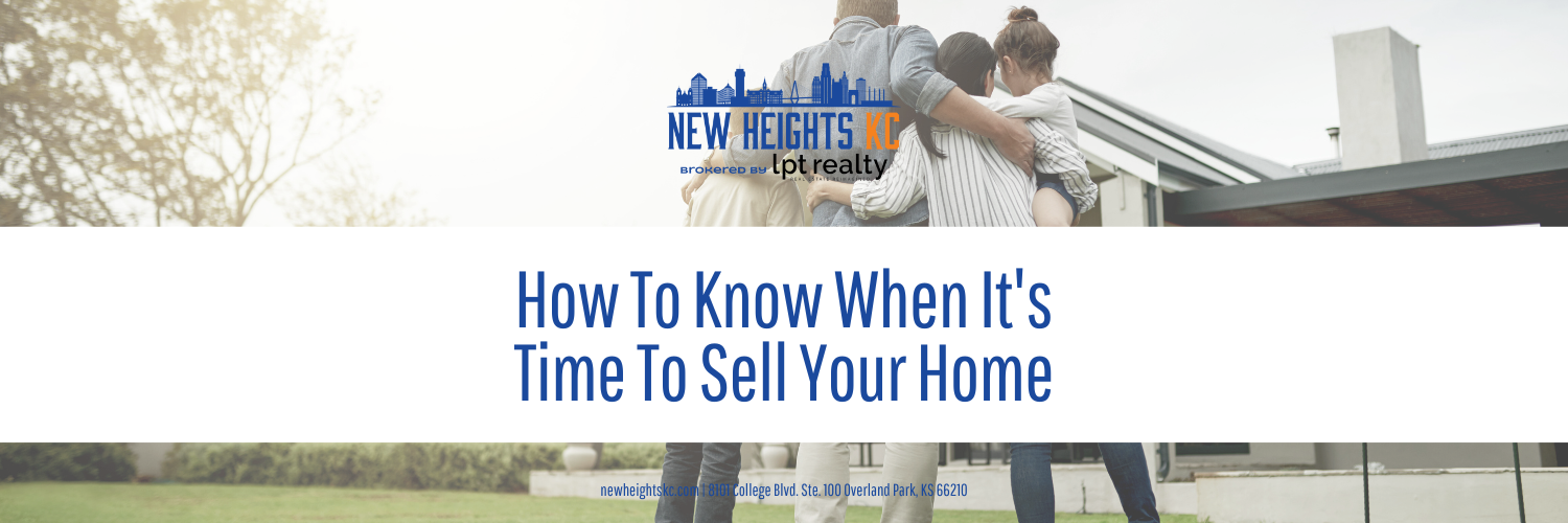 Family stands outdoors in front of a house, with text overlay reading "How To Know When It's Time To Sell Your Home" and real estate company information.
