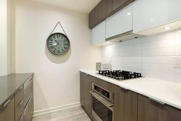 51 Waterfront Mews SW #205, Calgary, AB T2P 0X3