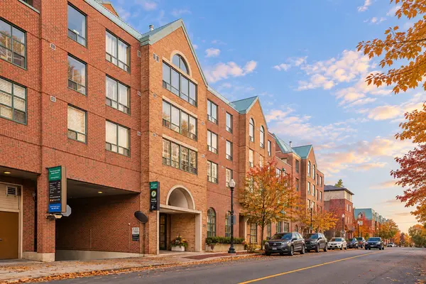 Autumn Streetscape with Red-Brick Apartments