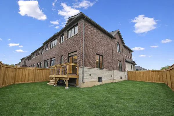 New townhouse and backyard with deck