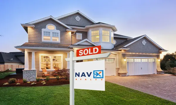Home with sold sign