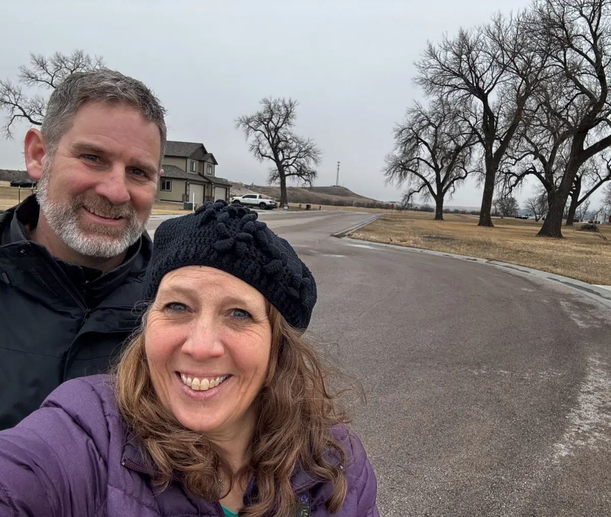 Arnie + Tina Sharp, Realtors in the Black Hills, preparing to list a house. 
