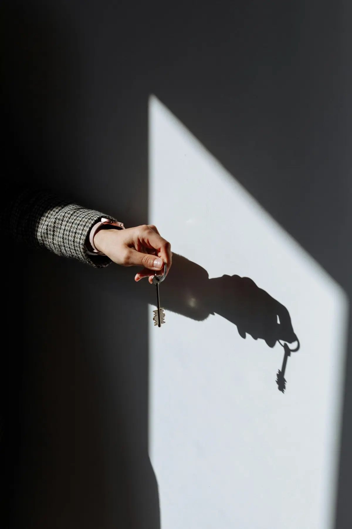 Real estate agent holding keys to a new home in Rapid City, SD