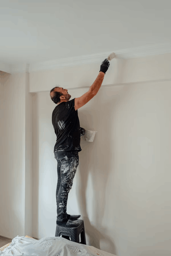 man painting-updating home for sell
