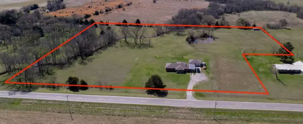 Discover Country Living on 9 Acres with a Pond