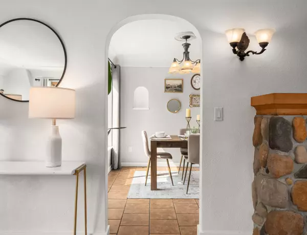 Open dining area with natural light and views of the backyard – Gatz Home Group Arlington listing.