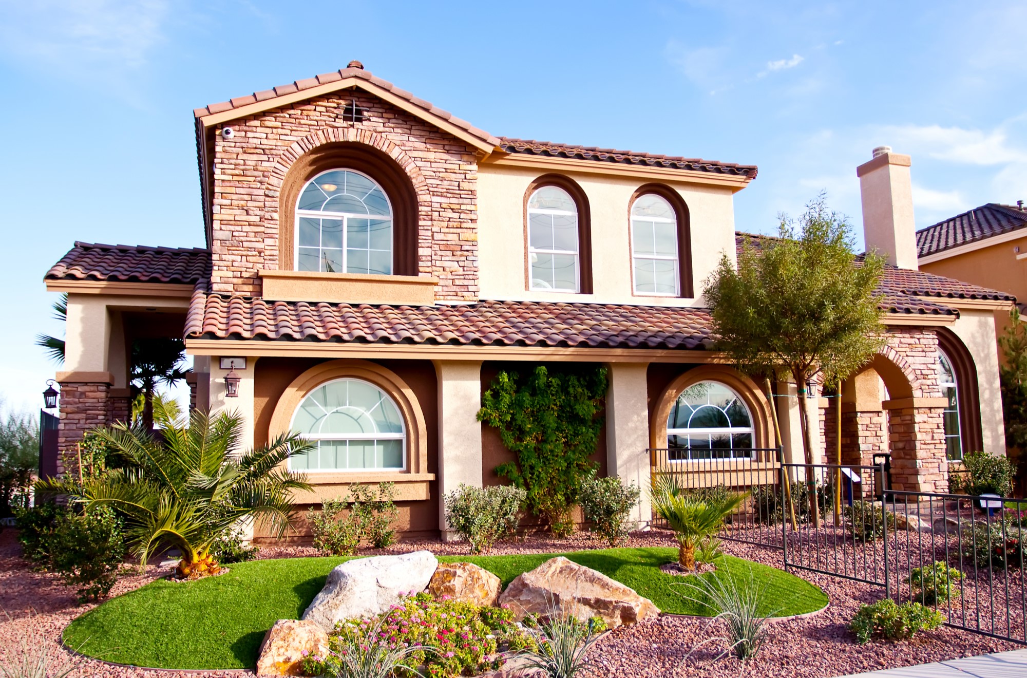 Spanish-style home exterior in Madeira Canyon community