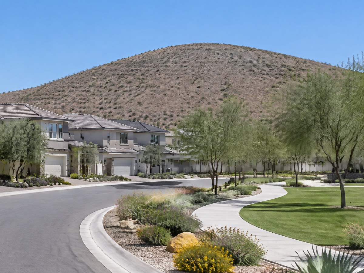 Illustration of a rounded brown desert hill above homes and a park path.