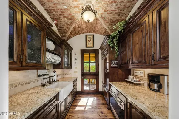 A Desert Masterpiece: Timeless Luxury Unveiled at 21606 W Palo Brea Cir