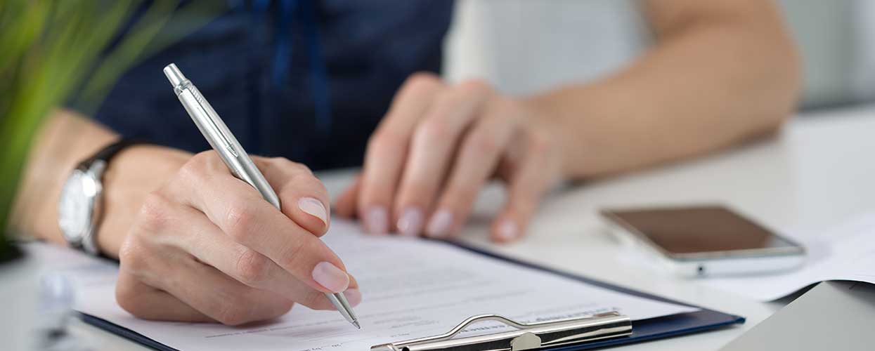 A person signing a contract