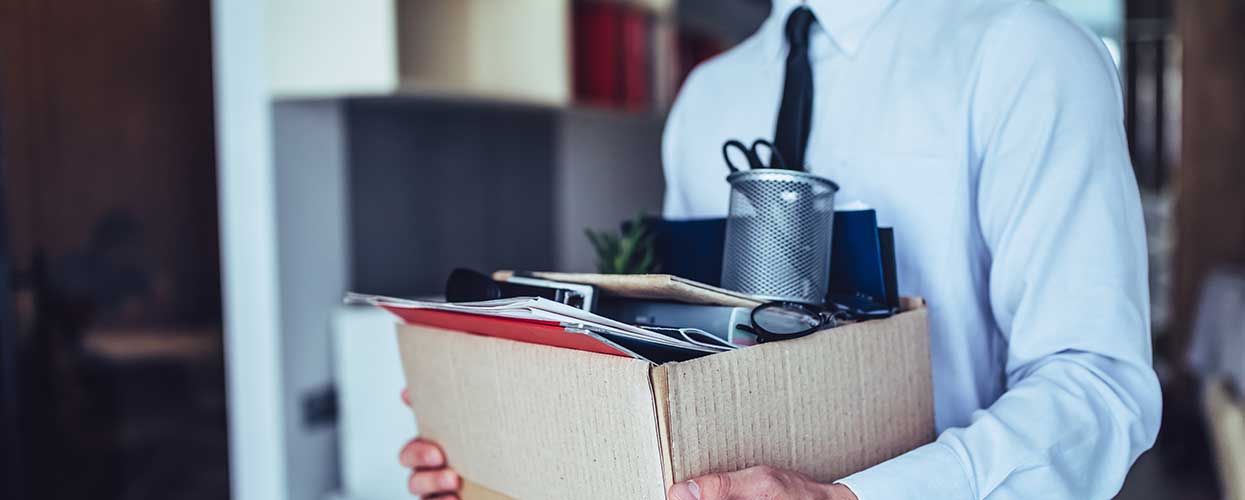 A man packing up his desk