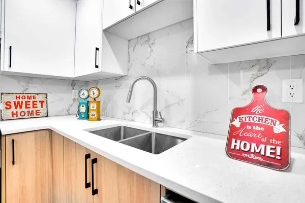 903B Queensland DR SE, Calgary, AB T2J 5E5