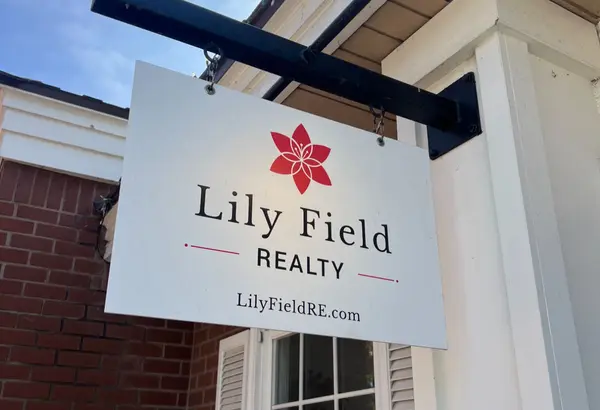 Photo of Lily Field Realty office shingle sign