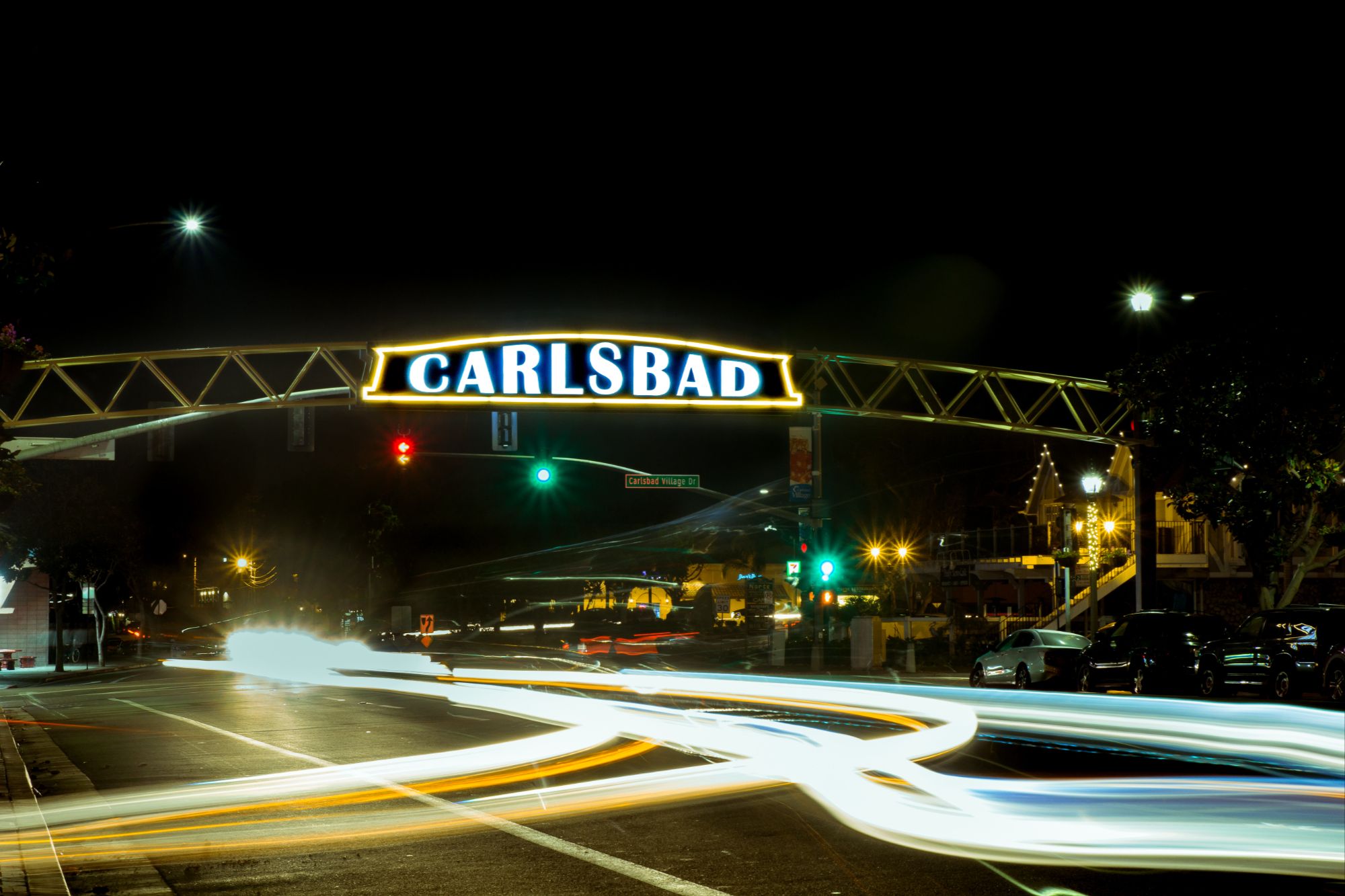 timelapse photo of the Carlsbad sign at night