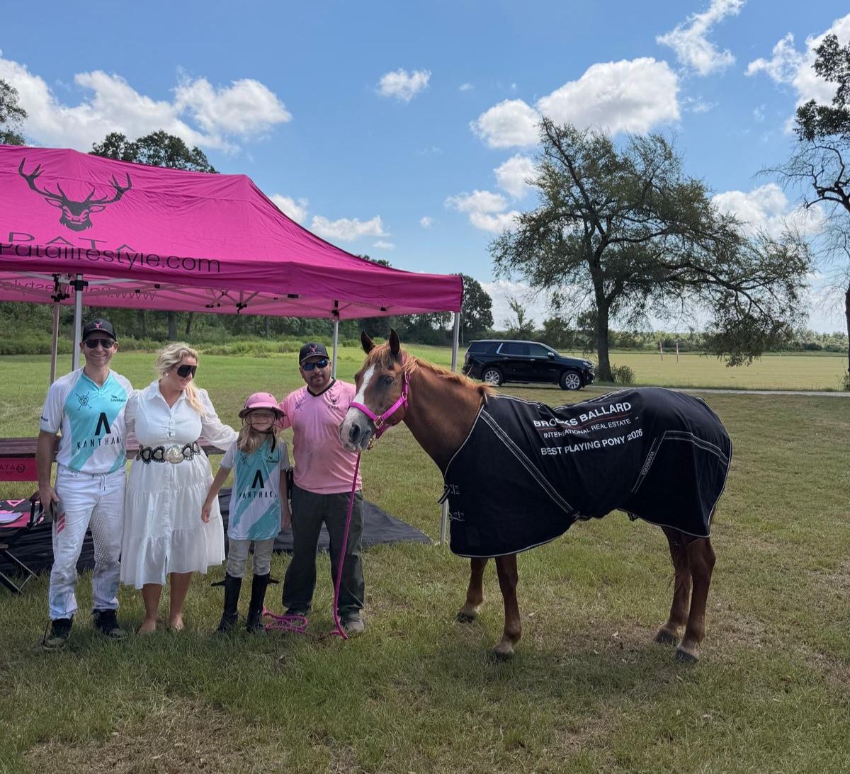 Best Playing Pony Primavera with Charlotte Lotti Kampshoff, her father Philip and Kanthaka team groom Mauricio at a polo tournament sponsored by Brooks Ballard International Real Estate