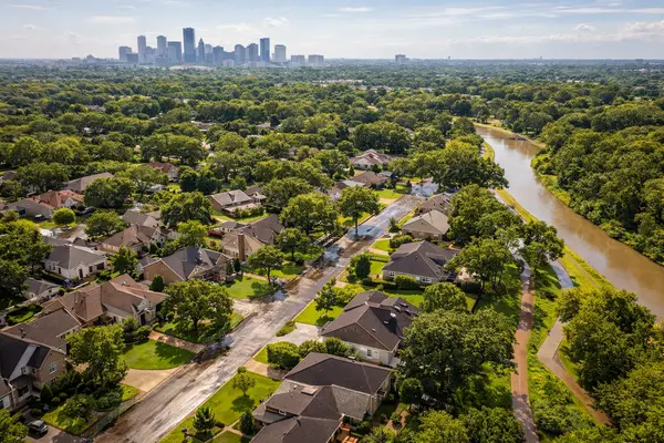Explore Braeswood, TX real estate with tree-lined streets and homes for sale near Brays Bayou.