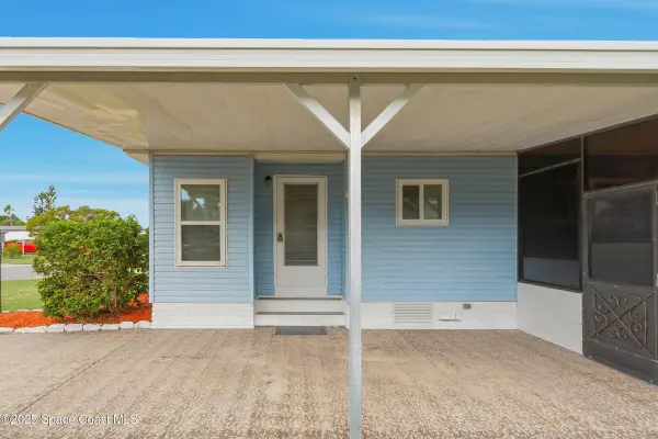 1209 Gardenia DR, Barefoot Bay, FL 32976