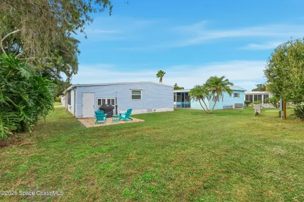 1209 Gardenia DR, Barefoot Bay, FL 32976