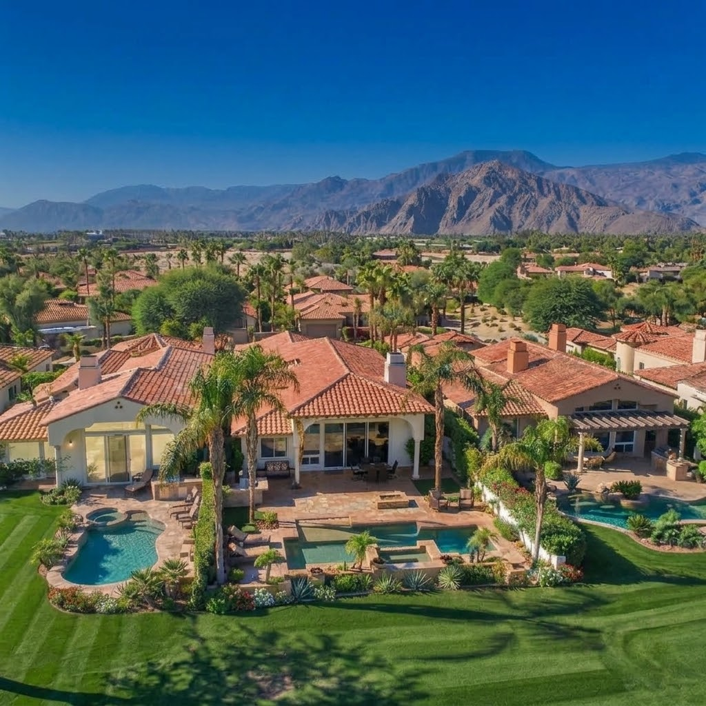 Rancho La Quinta residence and surrounding homes with mature landscaping, private pools and Santa Rosa Mountain views in La Quinta, California