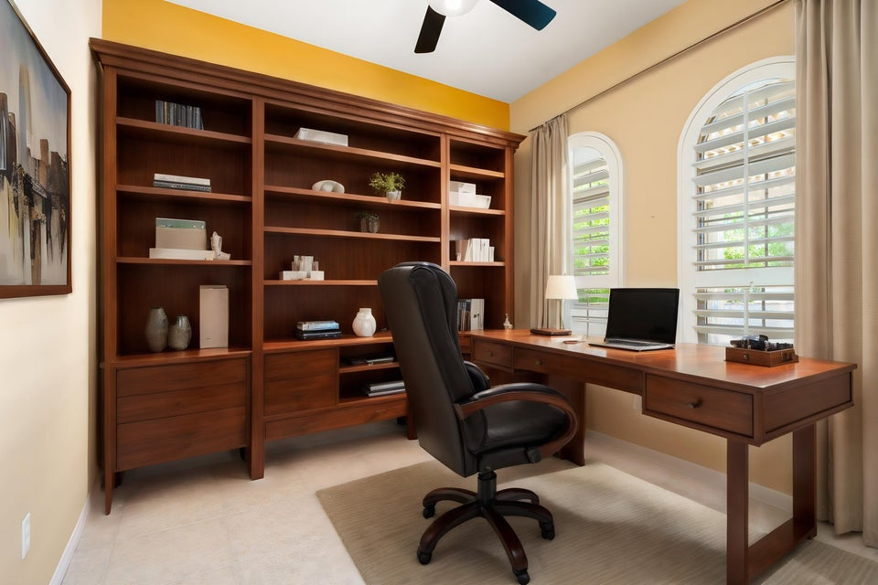 Home office with built-in cabinetry inside a Sun City Shadow Hills residence in Indio, California