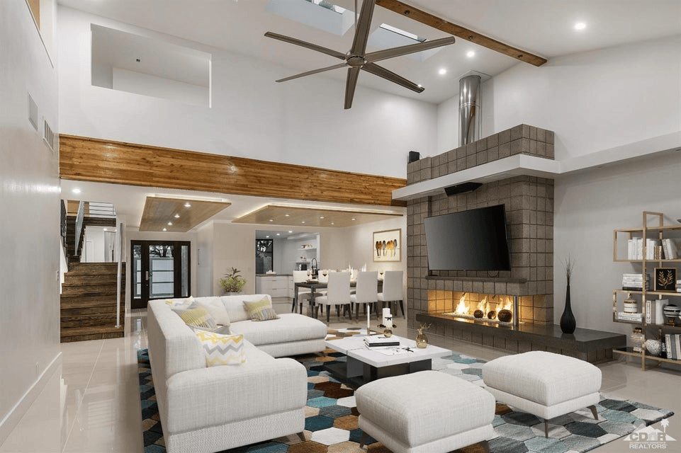 Vista Canyon residence in Palm Springs featuring a dramatic open great room, fireplace, high ceilings and contemporary architectural details