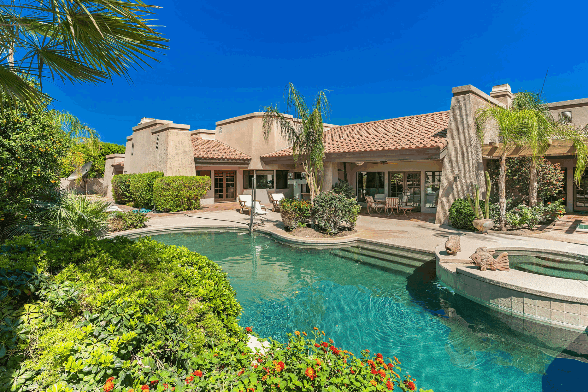 Private swimming pool and outdoor living area at a Bermuda Dunes Country Club residence in Bermuda Dunes, California