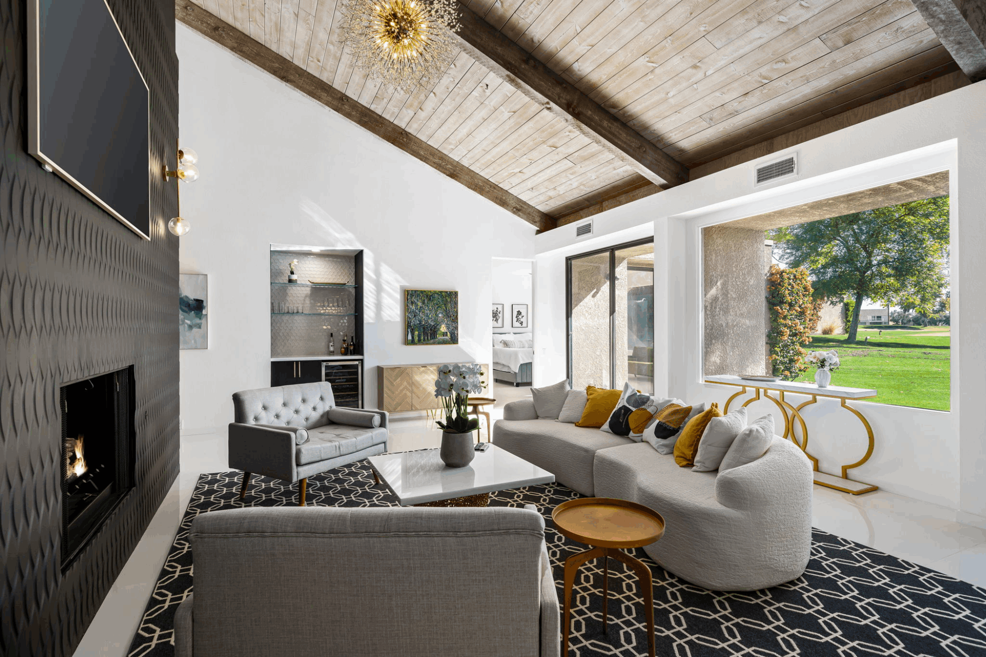 Renovated Mission Hills Country Club condominium with vaulted wood ceiling, fireplace and golf course views in Rancho Mirage, California