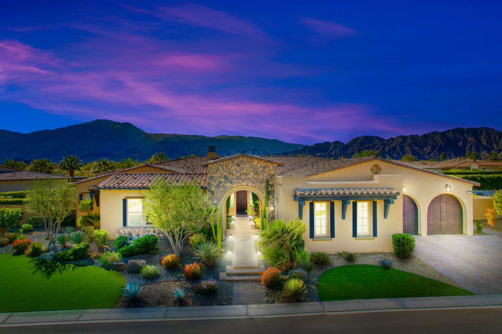 Luxury residence with desert landscaping and mountain views in the Griffin Ranch community of La Quinta