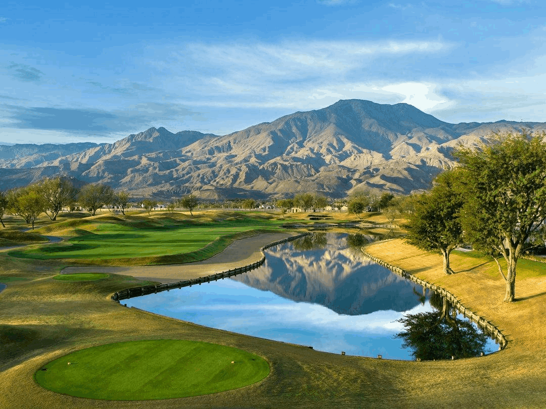 Aerial view of PGA WEST golf course, lakes and mountains in La Quinta, California