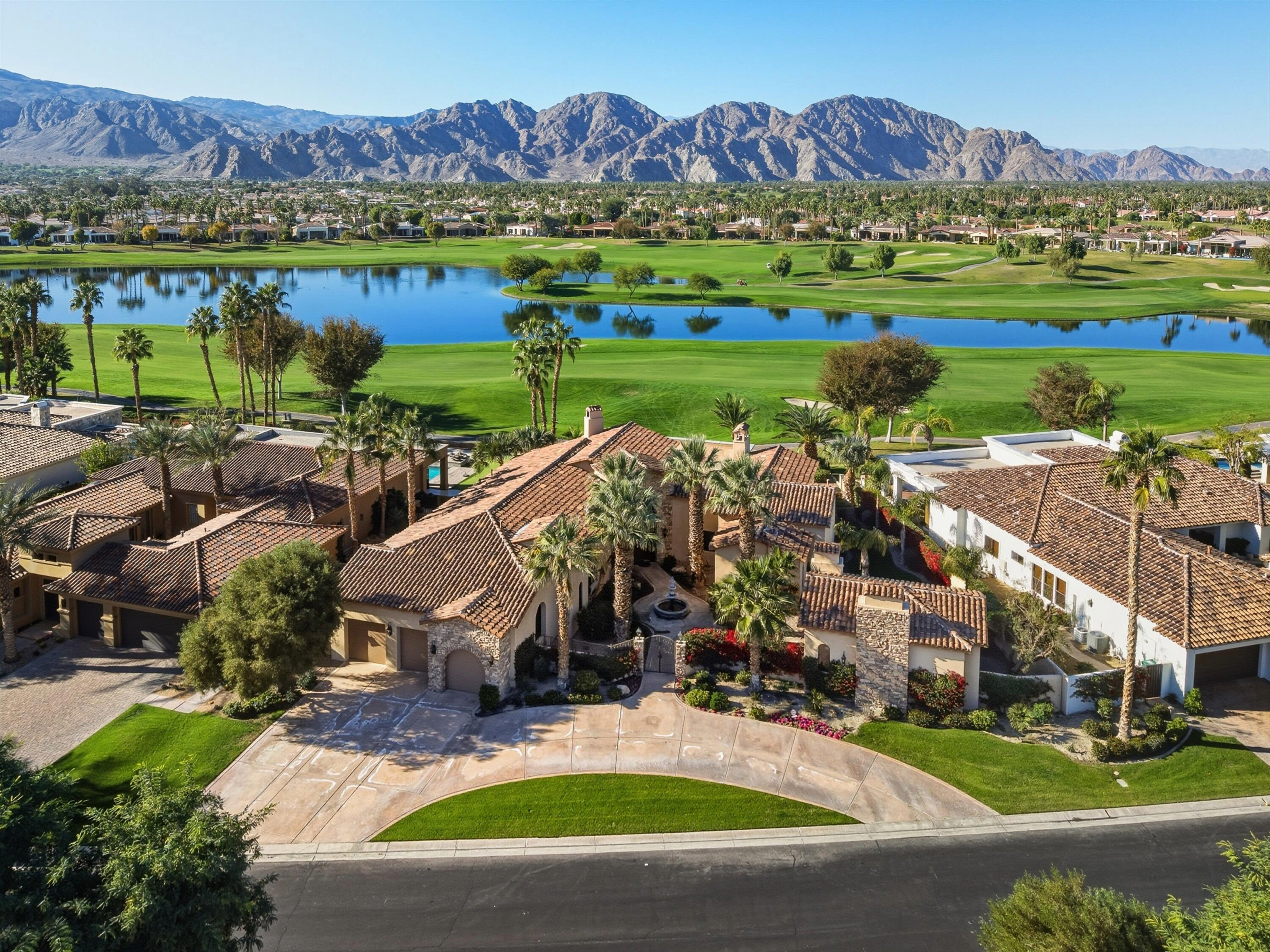 PGA WEST home overlooking a golf course, lake and Santa Rosa Mountains in La Quinta, California