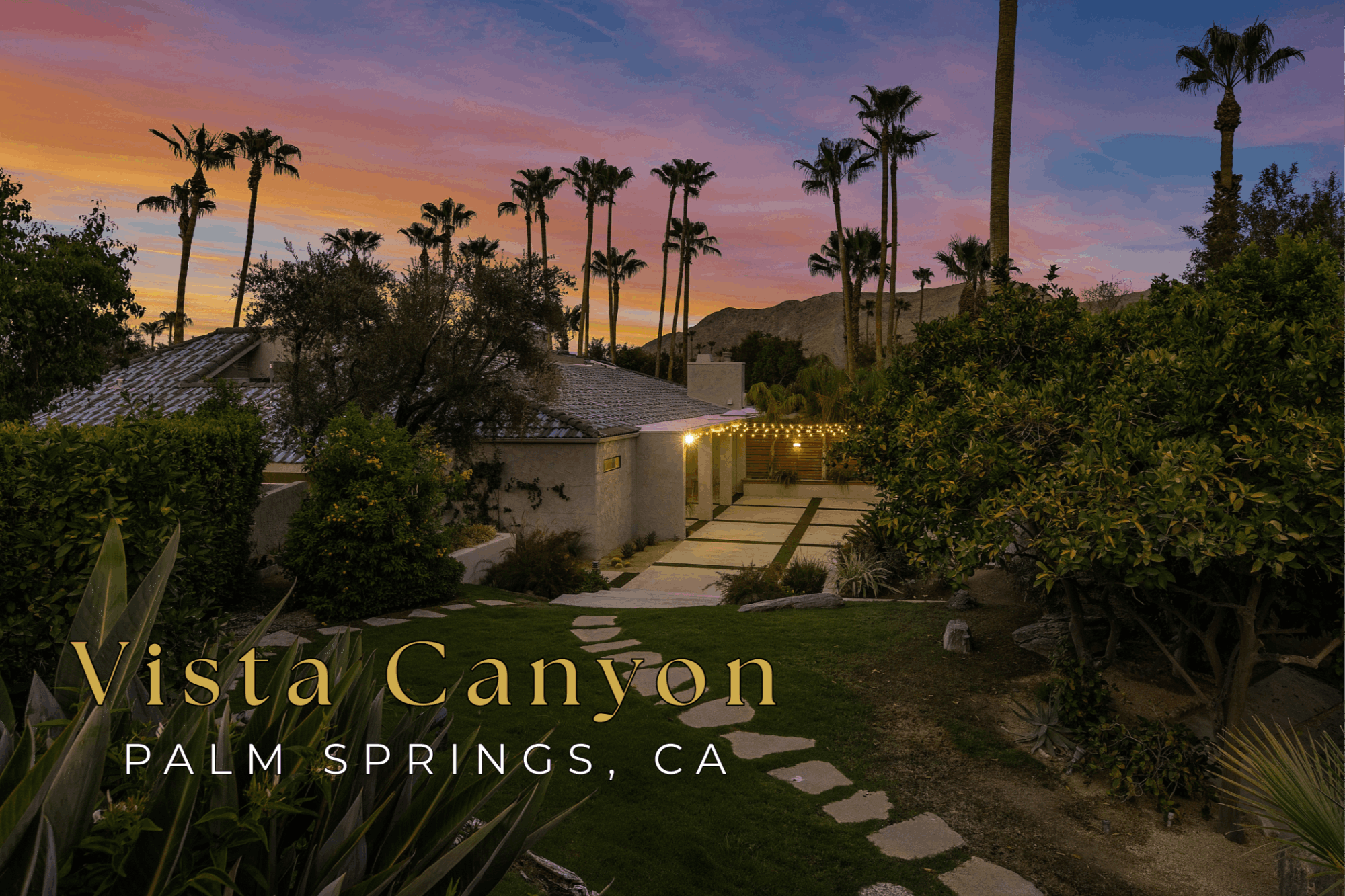 Vista Canyon in South Palm Springs, California, featuring desert architecture, mature landscaping, palm trees and San Jacinto Mountain views at sunset