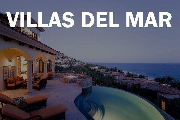 A luxurious property with a pool and lounge chairs