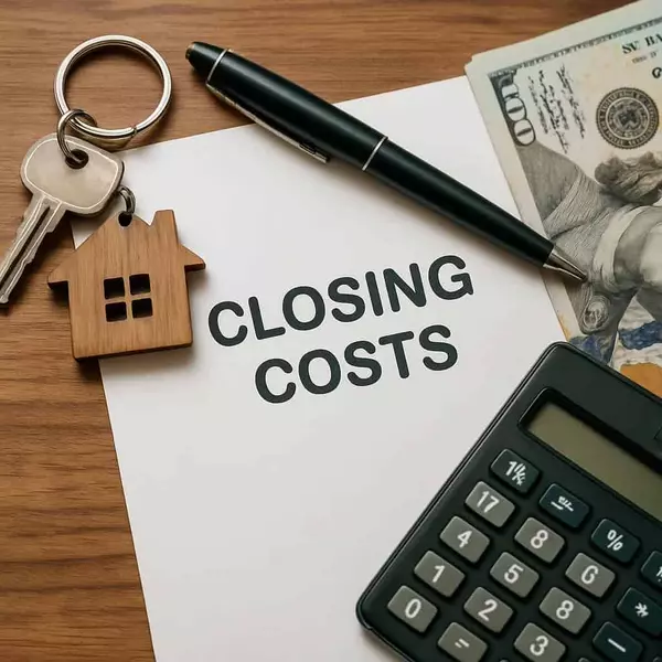 Kentucky homebuyers signing final paperwork and paying closing costs with Williams Elite Realty