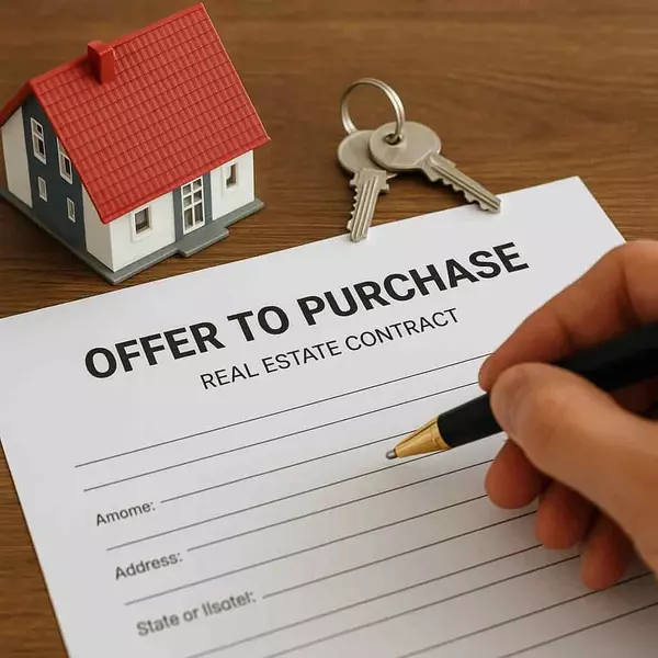 Homebuyer in Kentucky making an offer on a property with Williams Elite Realty agent