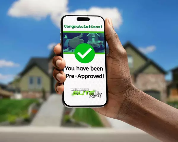 Hand holding smartphone showing mortgage pre-approval screen with green checkmark, promoting fast lender matching and pre-approval through Williams Elite Realty in Kentucky