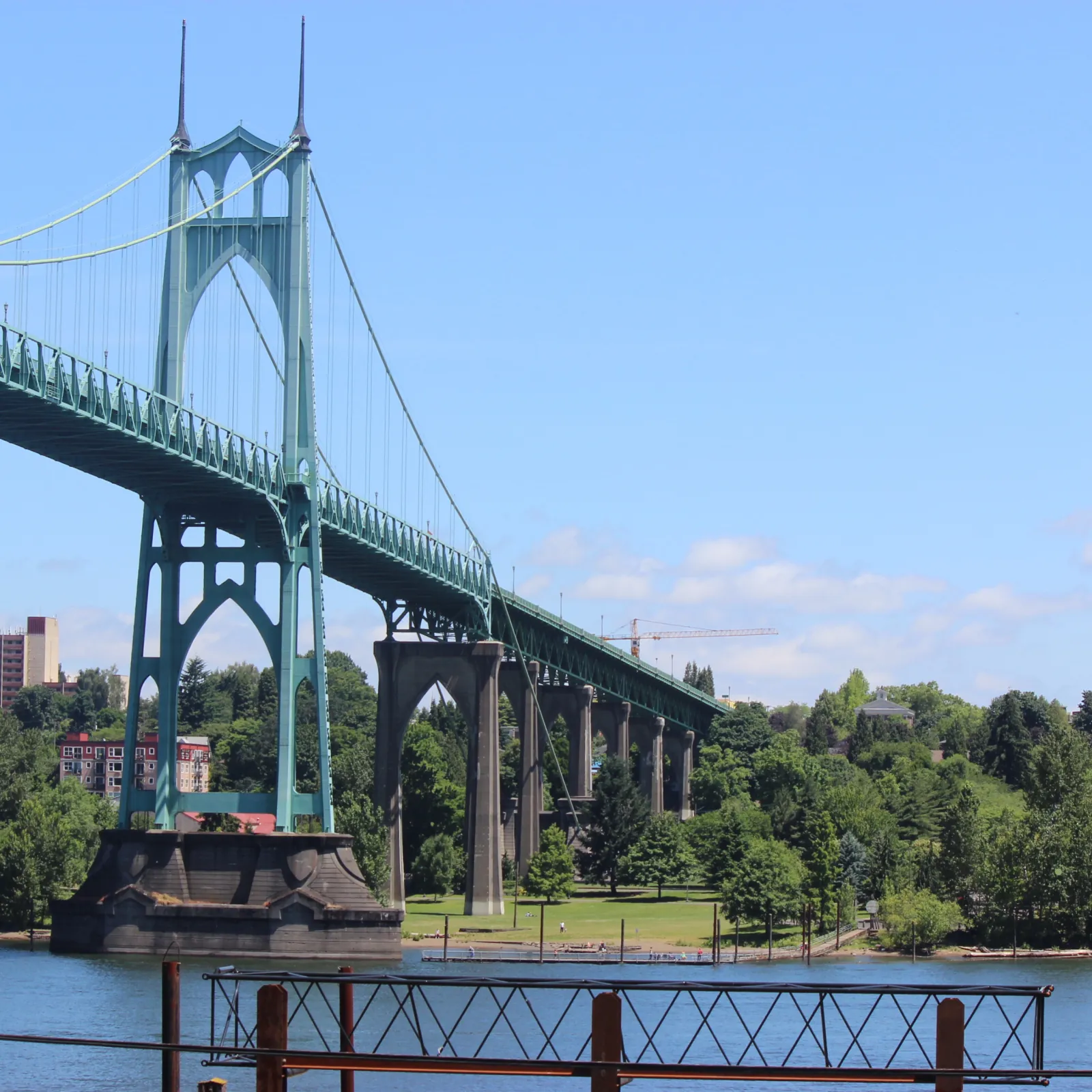 St. Johns Bridge with aviation green gothic towers at golden hour