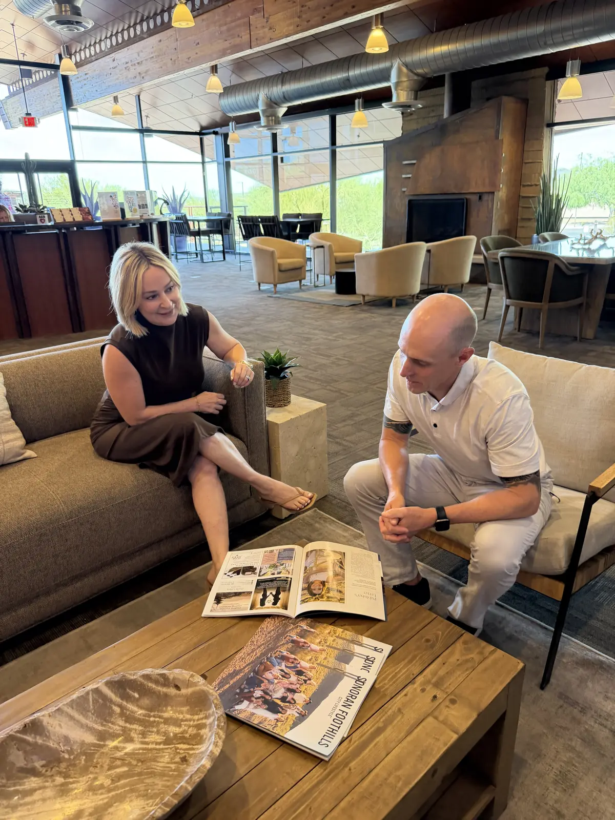 Realtor Shelley Sakala communicating with a client in Fireside Community Center.
