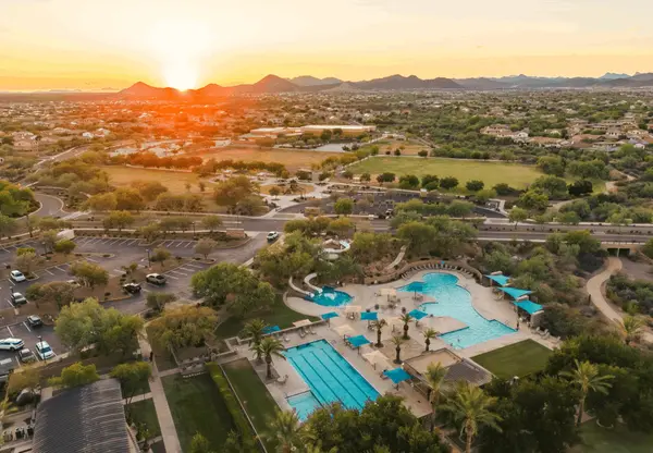 Aerial view of Vistancia pool and community at sunset. 
