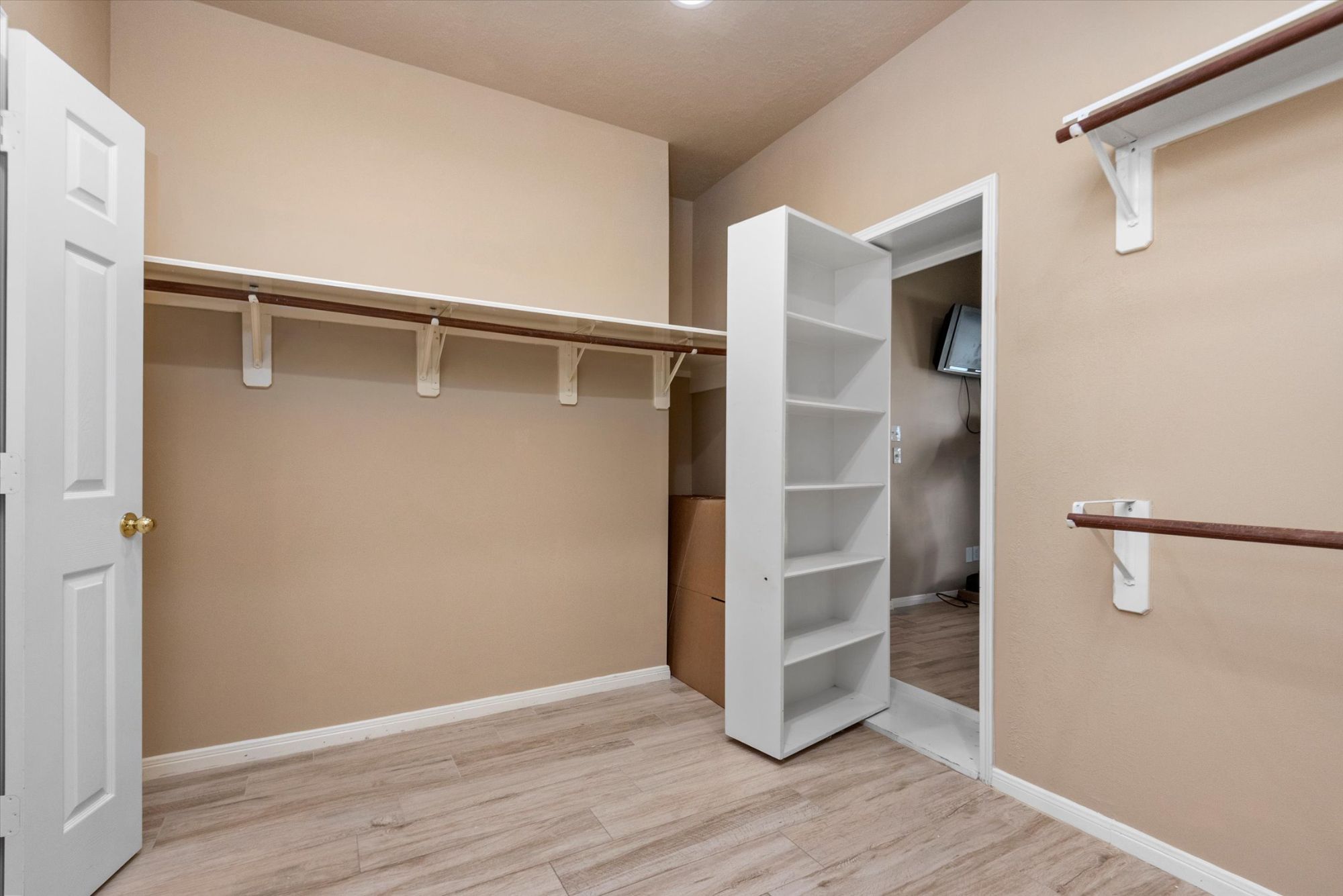 hidden storage behind bookcase