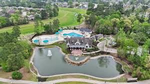 3639 Cottage Pines Lane Spring TX in The Falls of Imperial Oaks HOA has 2 pools, tennis courts, and walking trails