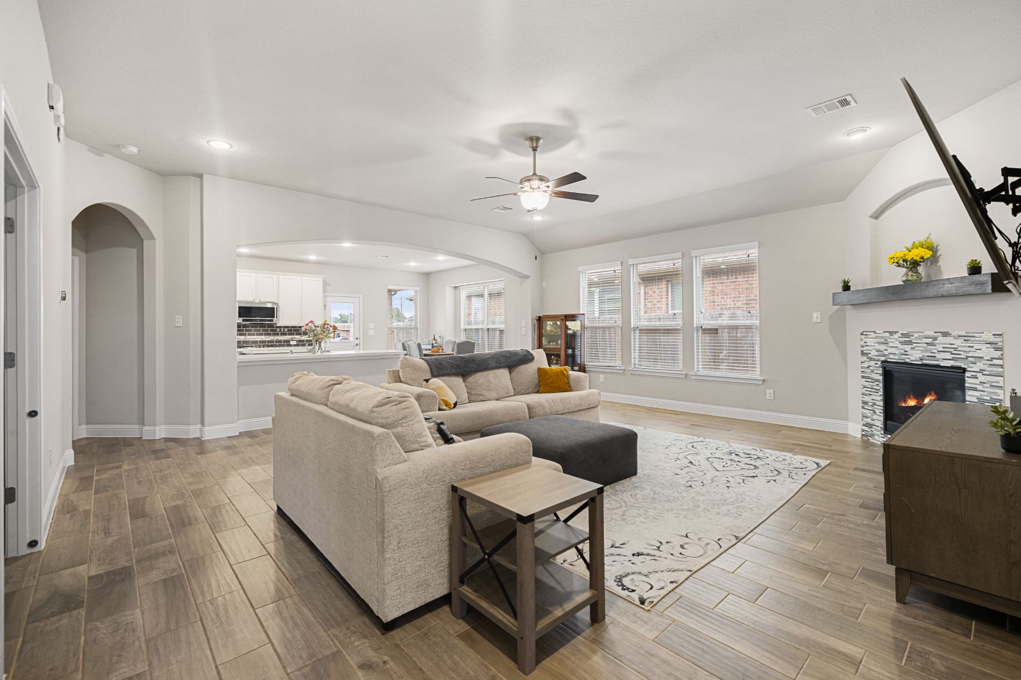 3639 Cottage Pines Lane Spring TX 77386 features an open floorplan, large living kitchen and dining area, and smart home features