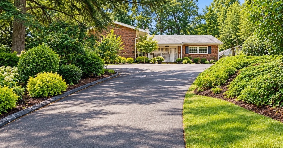 Central Ohio home seen from the street, showing the driveway and parking buyers would use