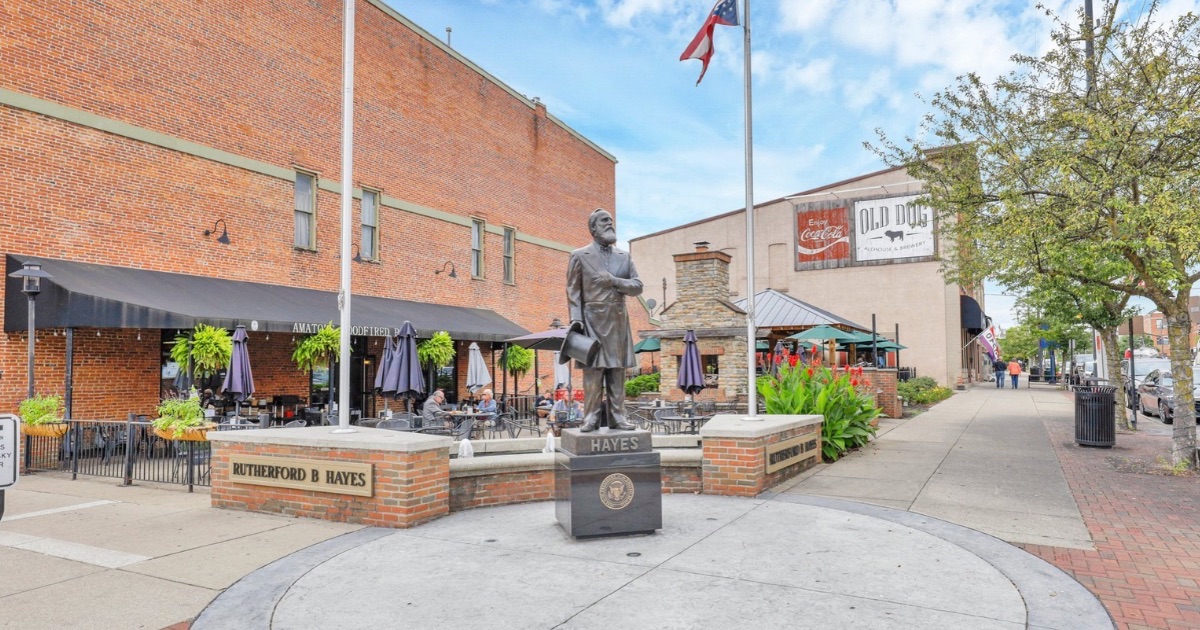 Historic downtown Delaware Ohio with traditional storefronts restaurants and pedestrian sidewalks