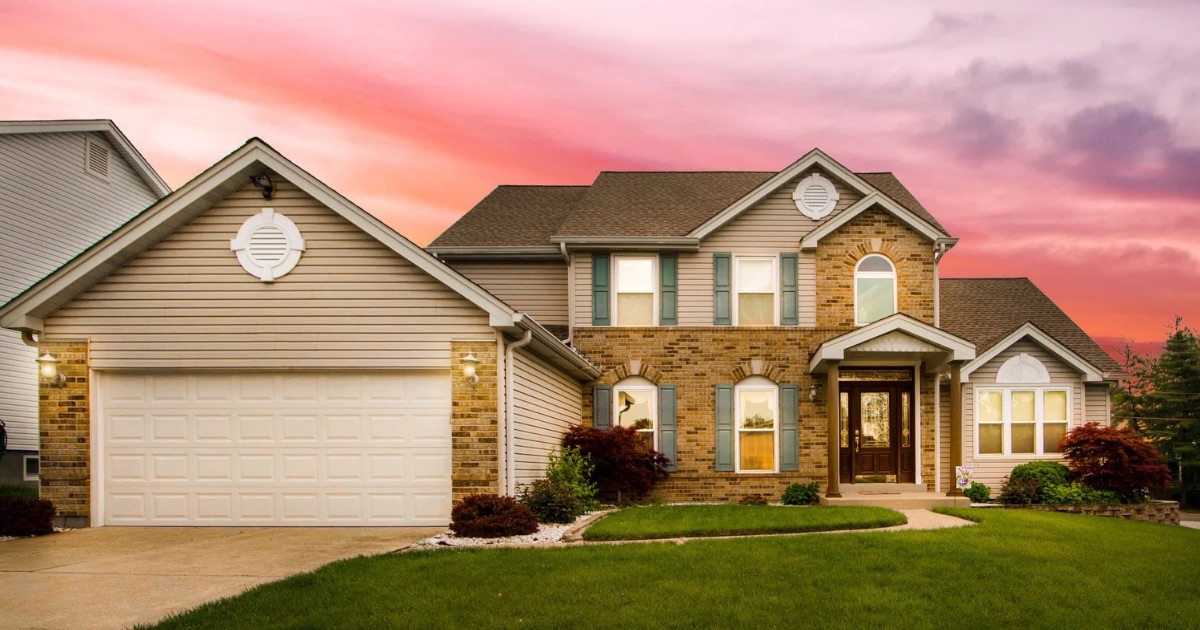 Well-maintained Columbus-area home with a landscaped front yard and welcoming entry