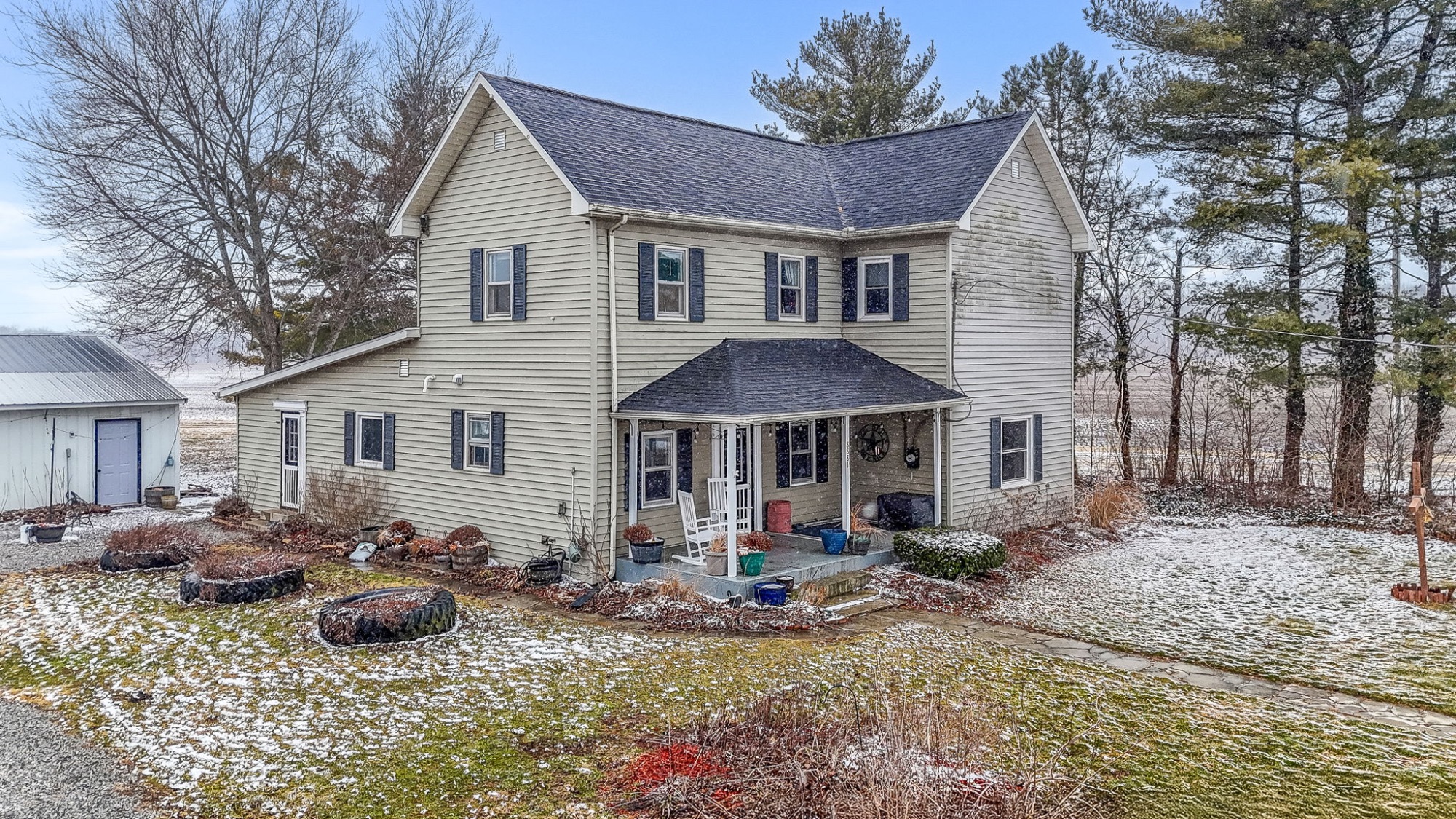 1900 farmhouse on 5.5 acres in Radnor Ohio in Buckeye Valley Schools