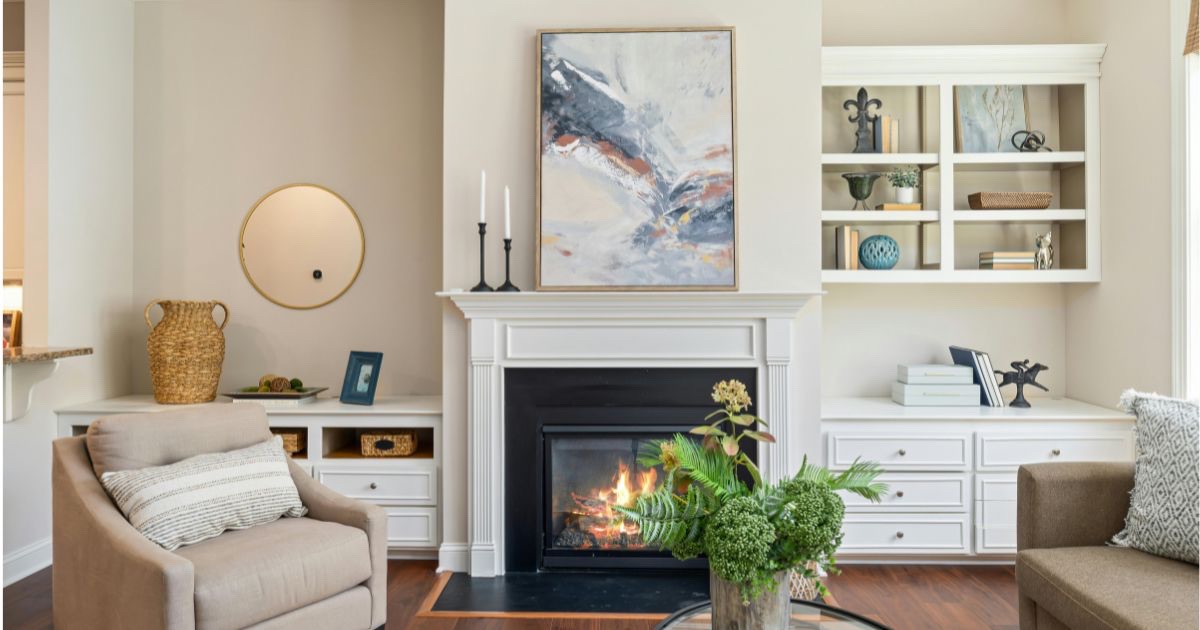 Bright clean living room with neutral paint and updated lighting in a Central Ohio home ready for showings