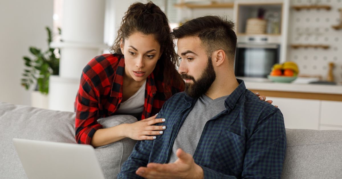 Central Ohio homeowners reviewing showing activity and buyer feedback on their listing