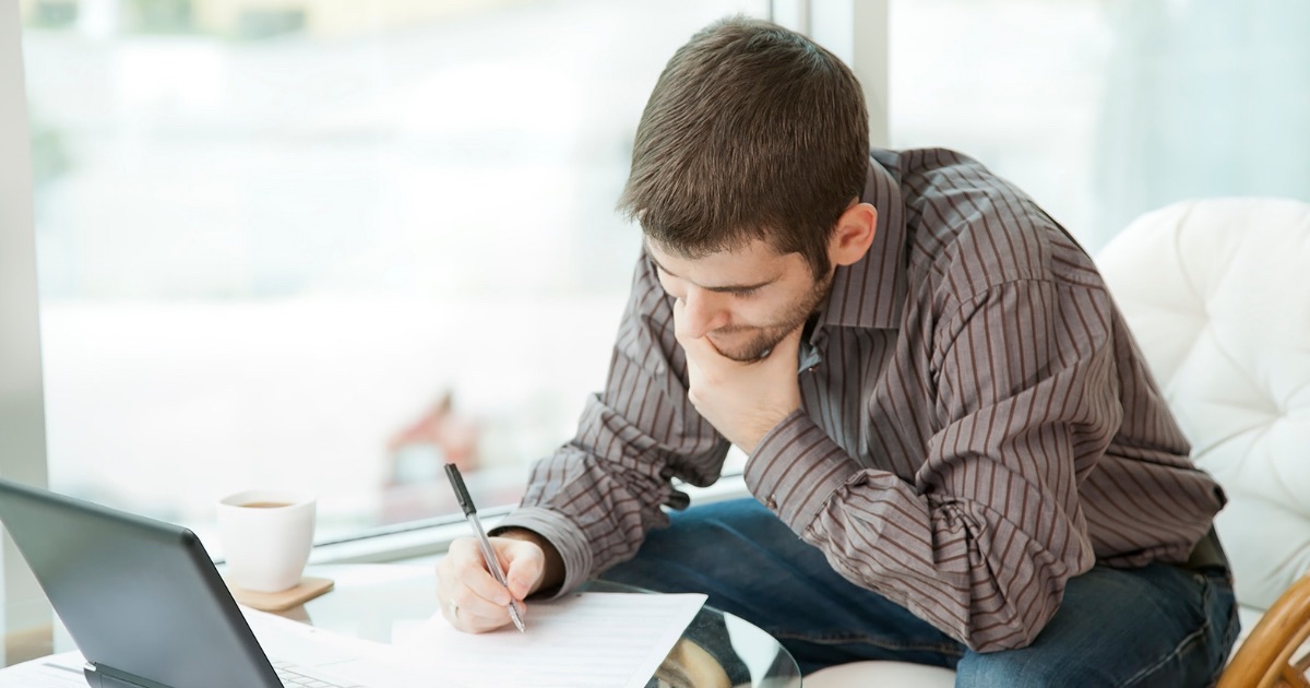 Ohio homeowner reviewing a residential property disclosure form before selling a home